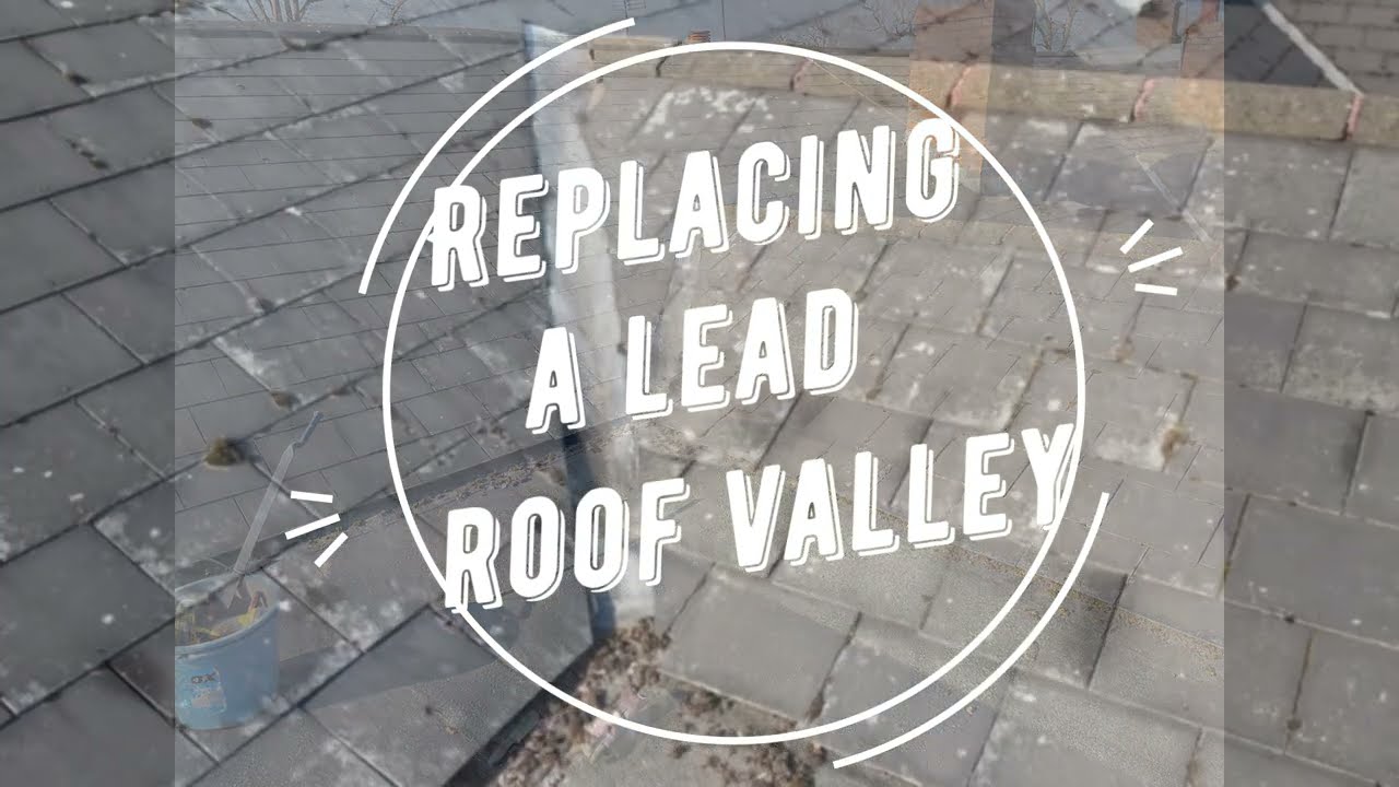Lead valley gutter repair on slate roof